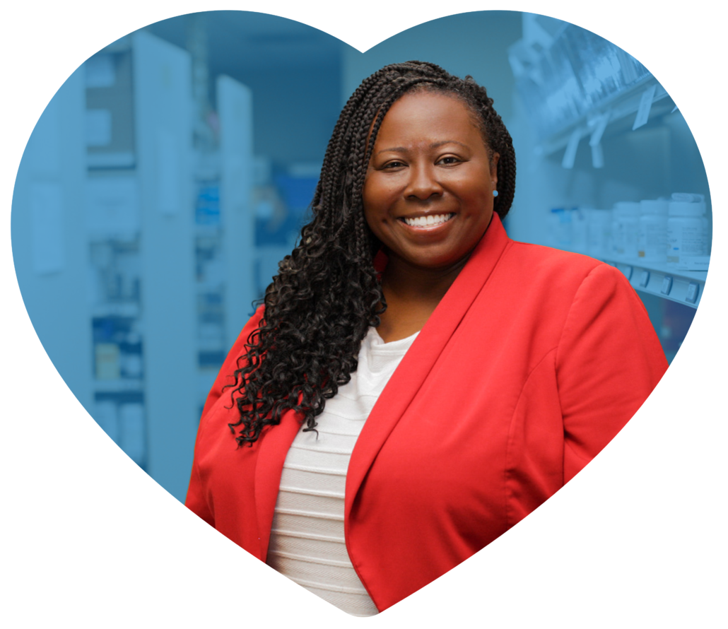 a woman smiling at camera embedded in a blue heart